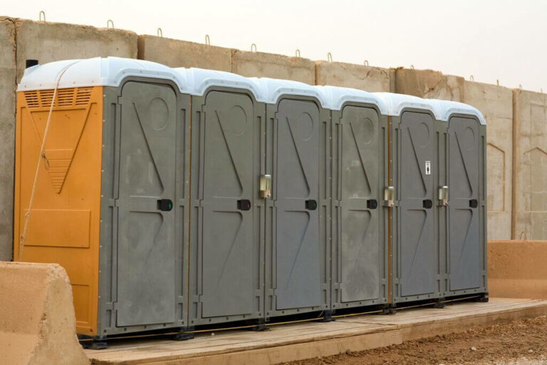 Portable Toilets Near a Wall